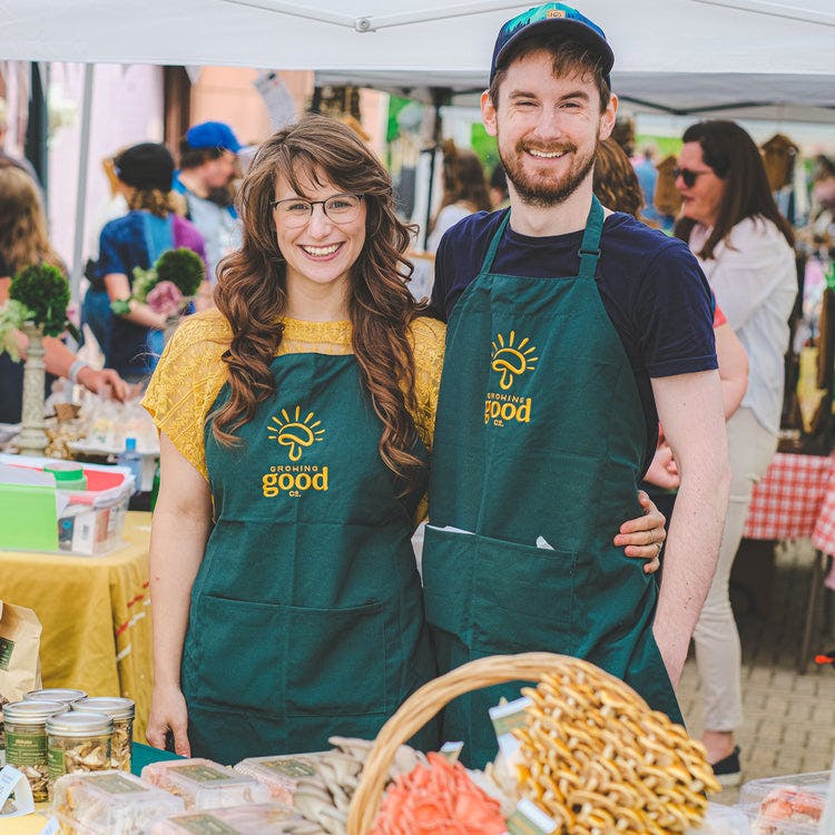 Photo of Colin & Nora at a farmers market